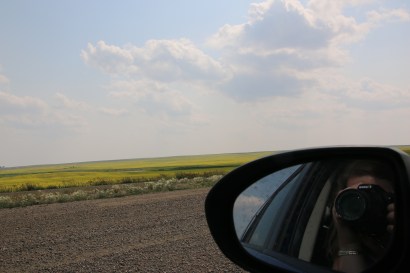 Your blogger admiring the beauty of wide open prairie skies and the colour of canola. 